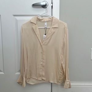 Brand new silky blouse with tag on